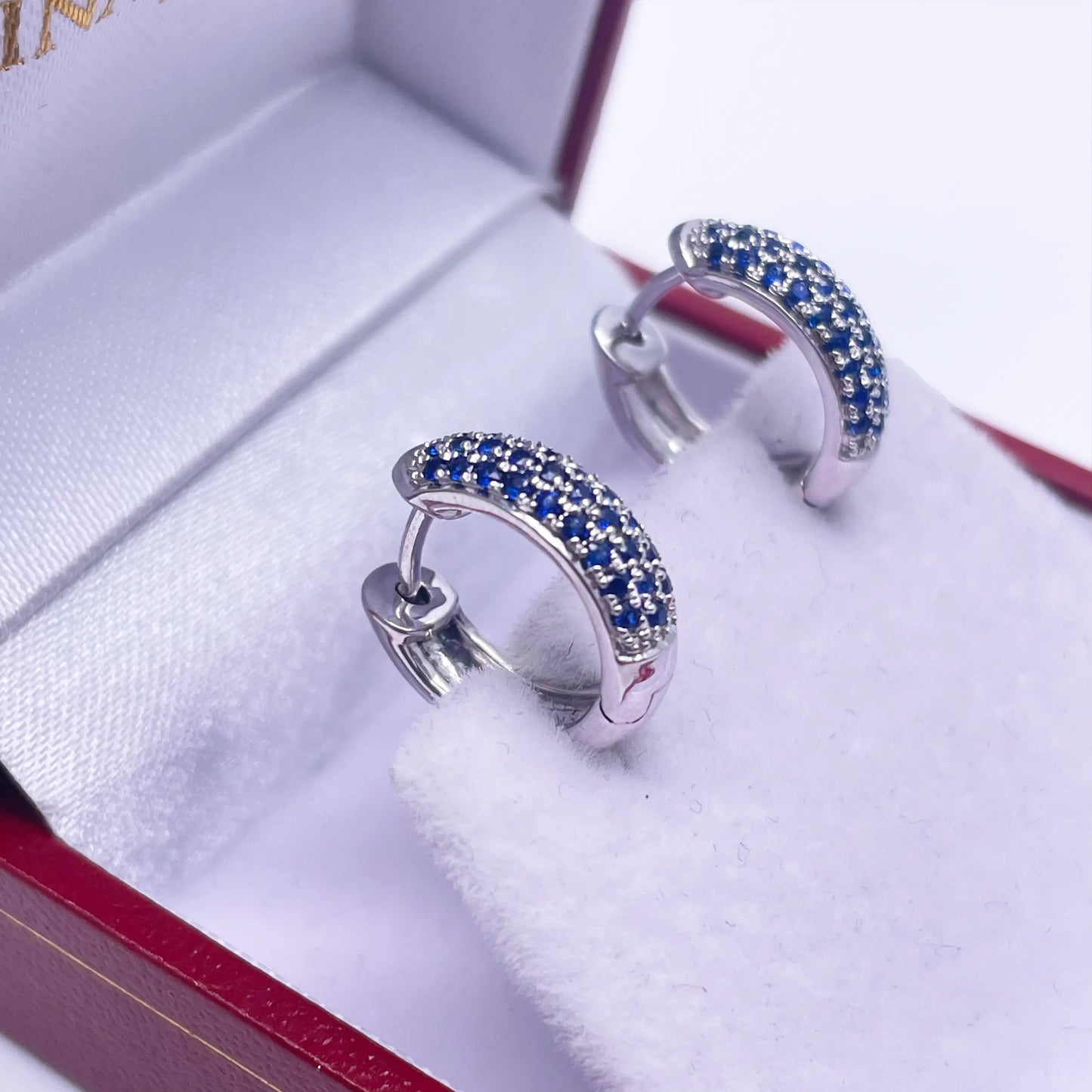14 Carat White Gold Blue Sapphire Pair of Hoop Earrings 0.33 carats 4mm wide 
