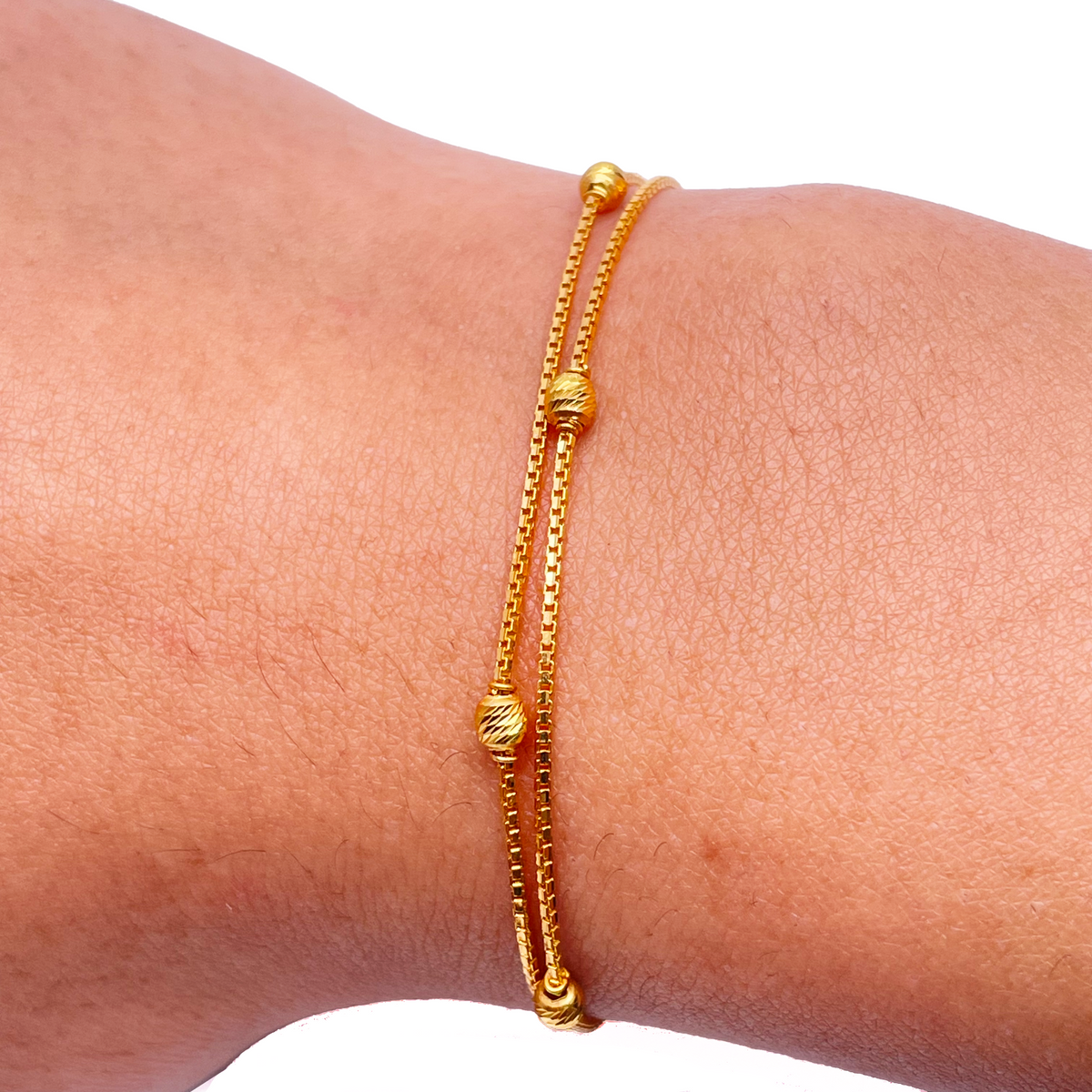 22kt gult guld dobbeltlags kæde med diamant-slebne perler armbånd